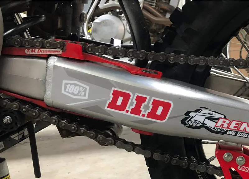 How To Tighten A Dirt Bike Chain Adjust And Lube Correctly 