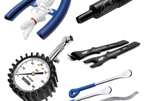 Tire changing tools for a dirt bike