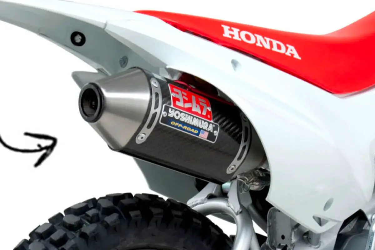 Close up of an aftermarket Honda CRF110 exhaust