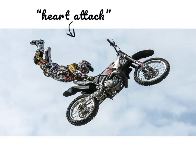 Man doing the Heart Attack FMX trick in the air
